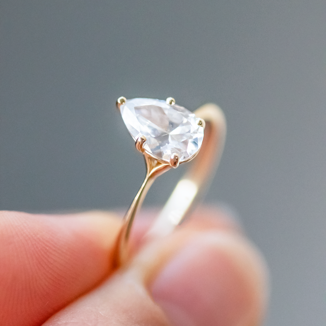 1.33CT Pear Cut Moissanite Engagement Ring in 18K Yellow Gold