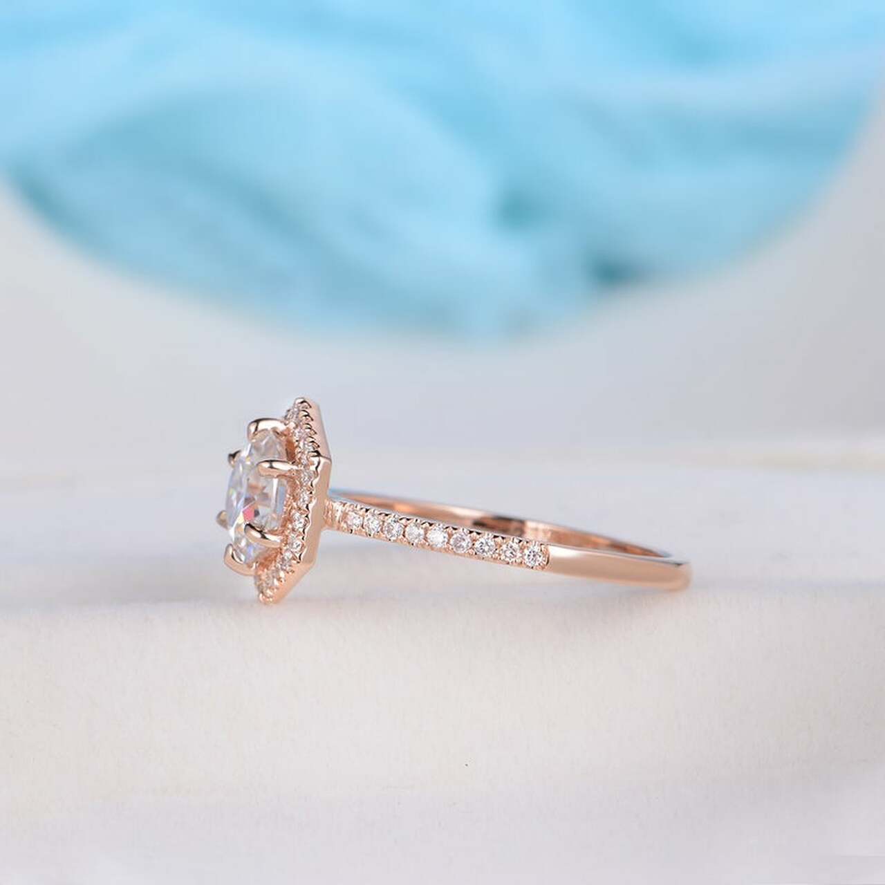 1-carat-round-moissanite-distinctive-halo-setting-rose-gold.jpg