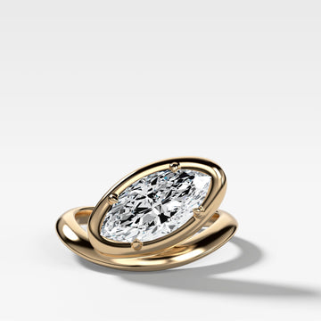 Contoured Club Engagement Ring with a Marquise Cut Diamond
