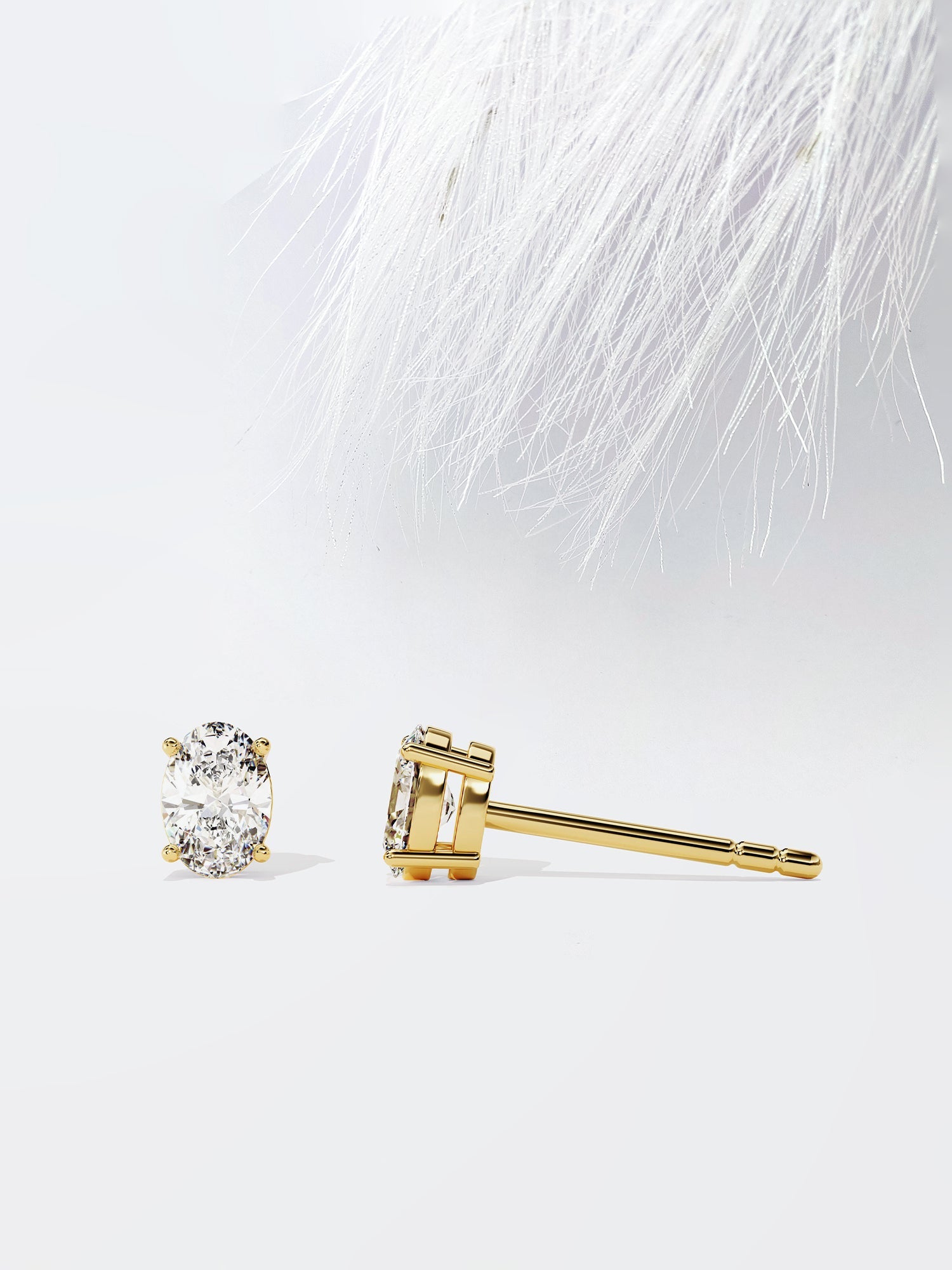 Oval Cut Moissanite Stud Diamond Earrings in Yellow Gold