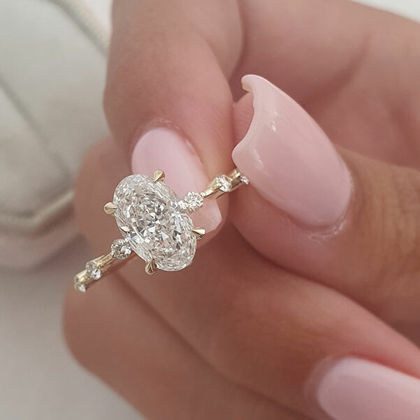 2.5-carat-oval-moissanite-thin-diamond-band-rose-gold.