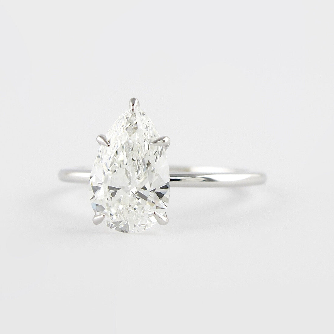 1.50CT Pear Cut Solitaire Moissanite Engagement Ring