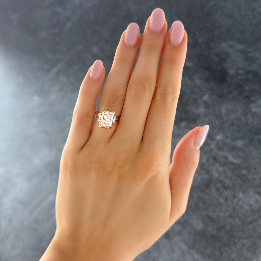 Three Stone Half Bezel Engagement Ring with Mini Baguette Side Stones and Emerald Cut Diamond No.1