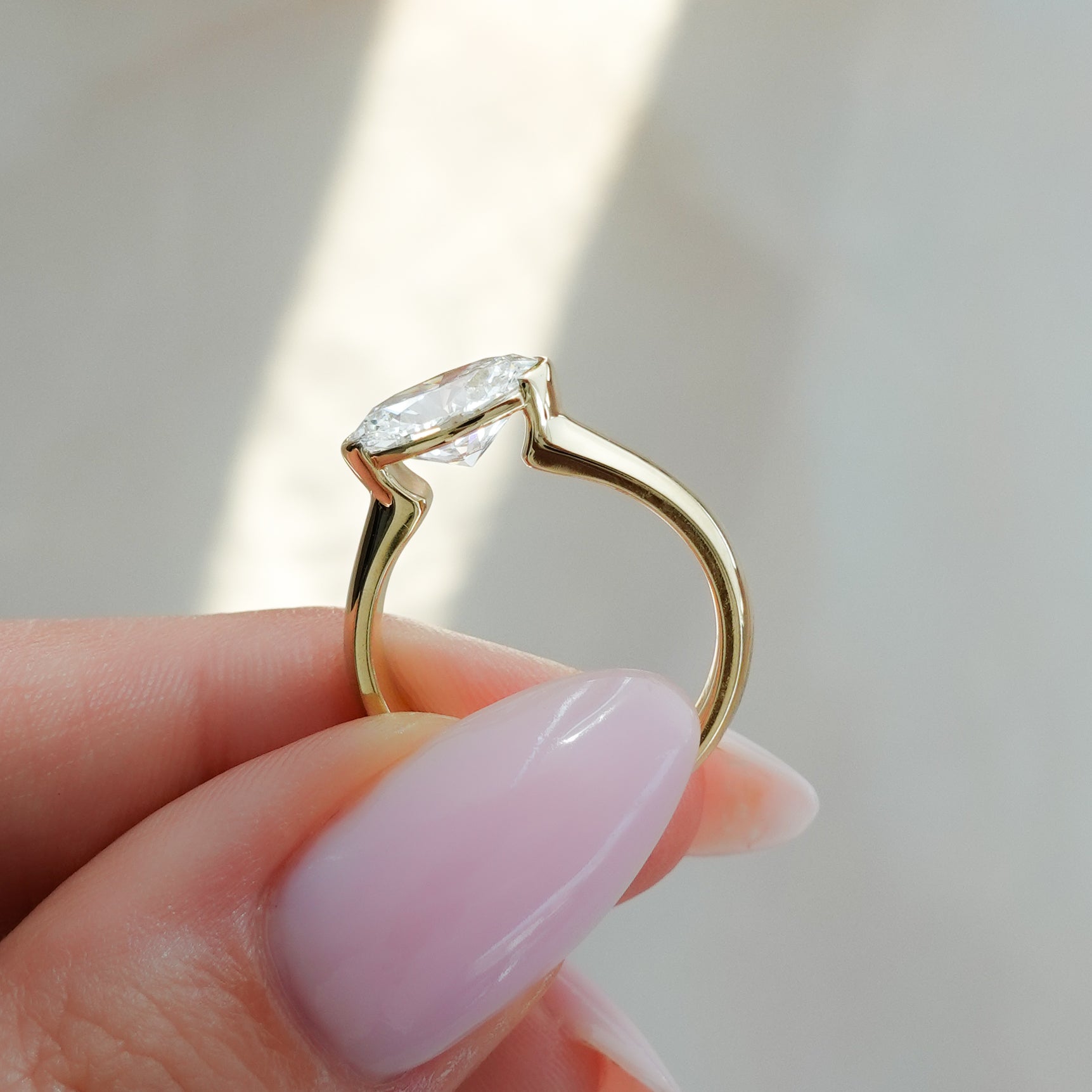 chunky-gold-solitaire-ring-half-bezel-setting