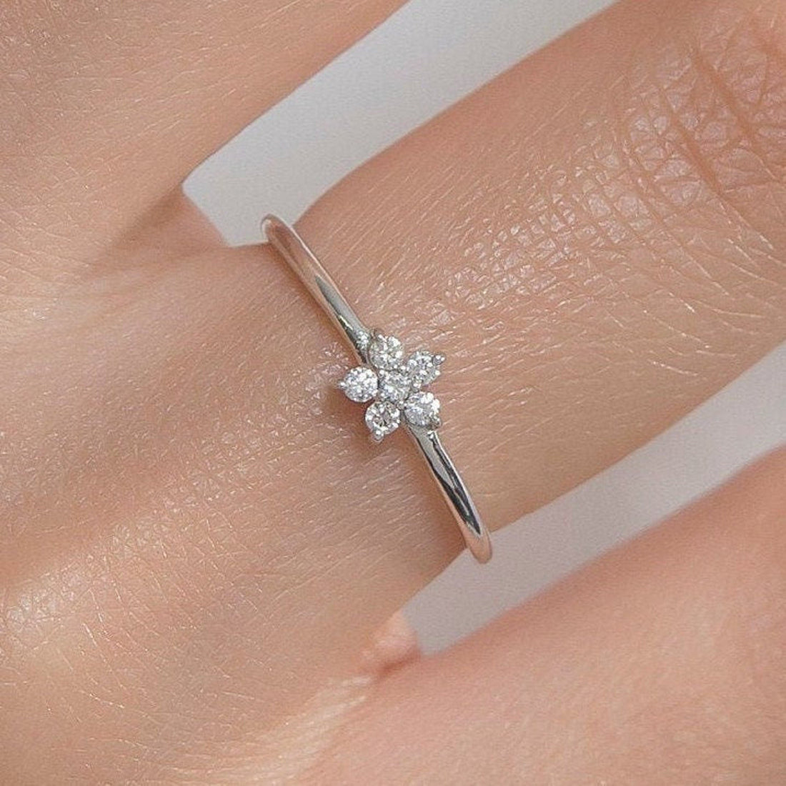 0.08 TCW Round Moissanite Flower Dainty Ring