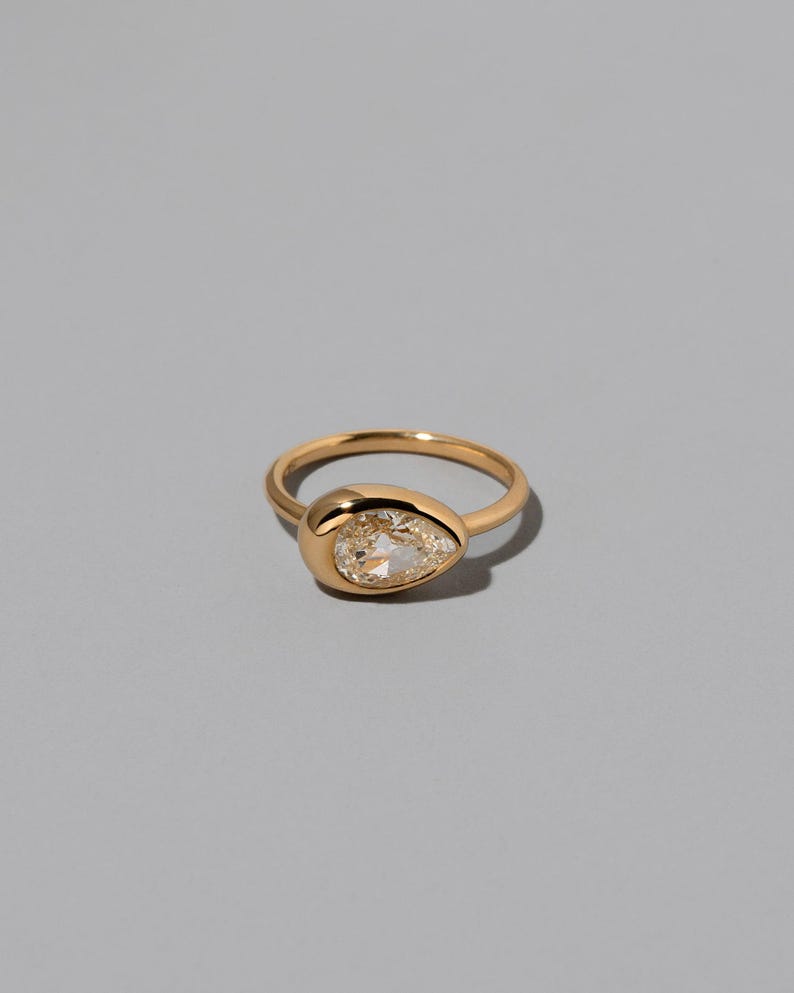 0.75CT-1.25CT Bezel Set Pear Shaped Moissanite Wide Band Engagement Ring