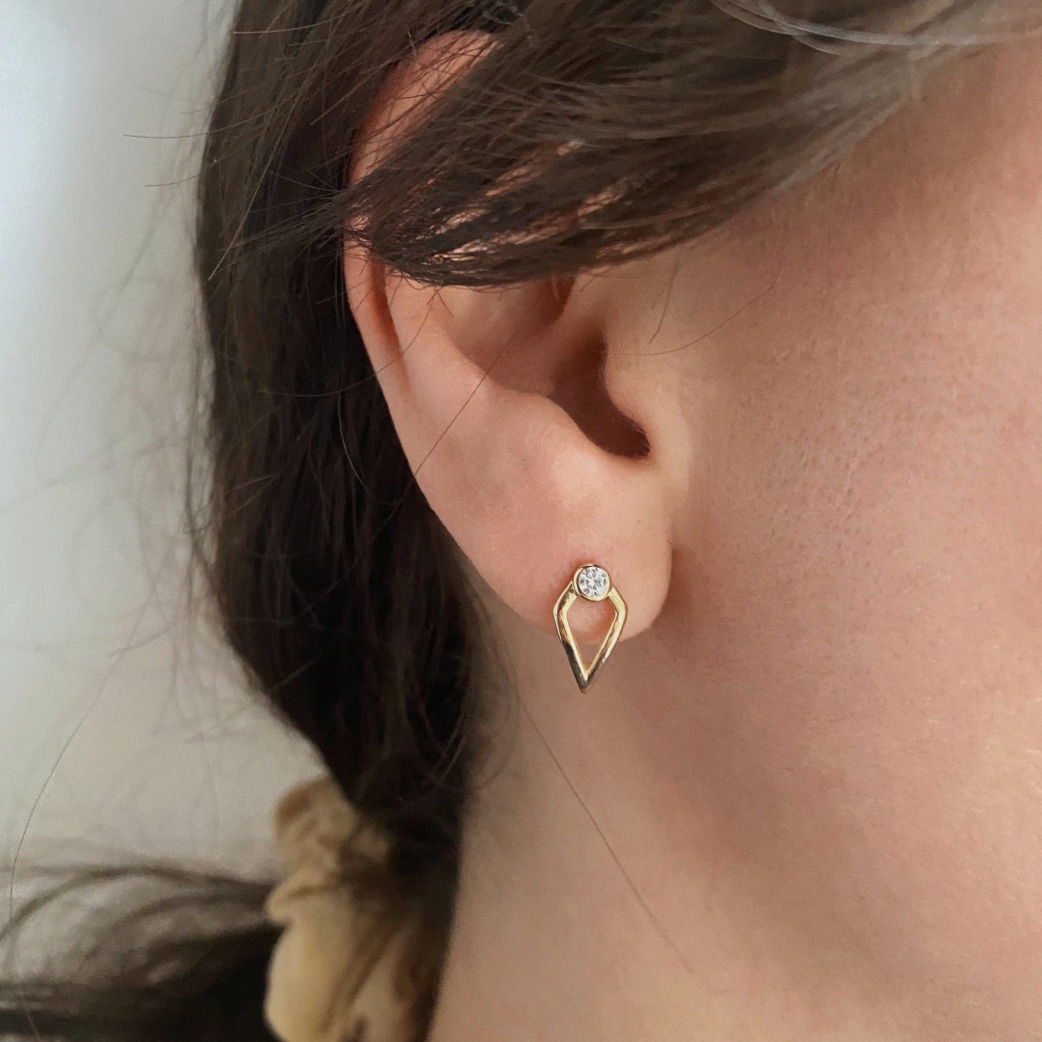 Round Cut Unique Moissanite Diamond Earrings in Yellow Gold