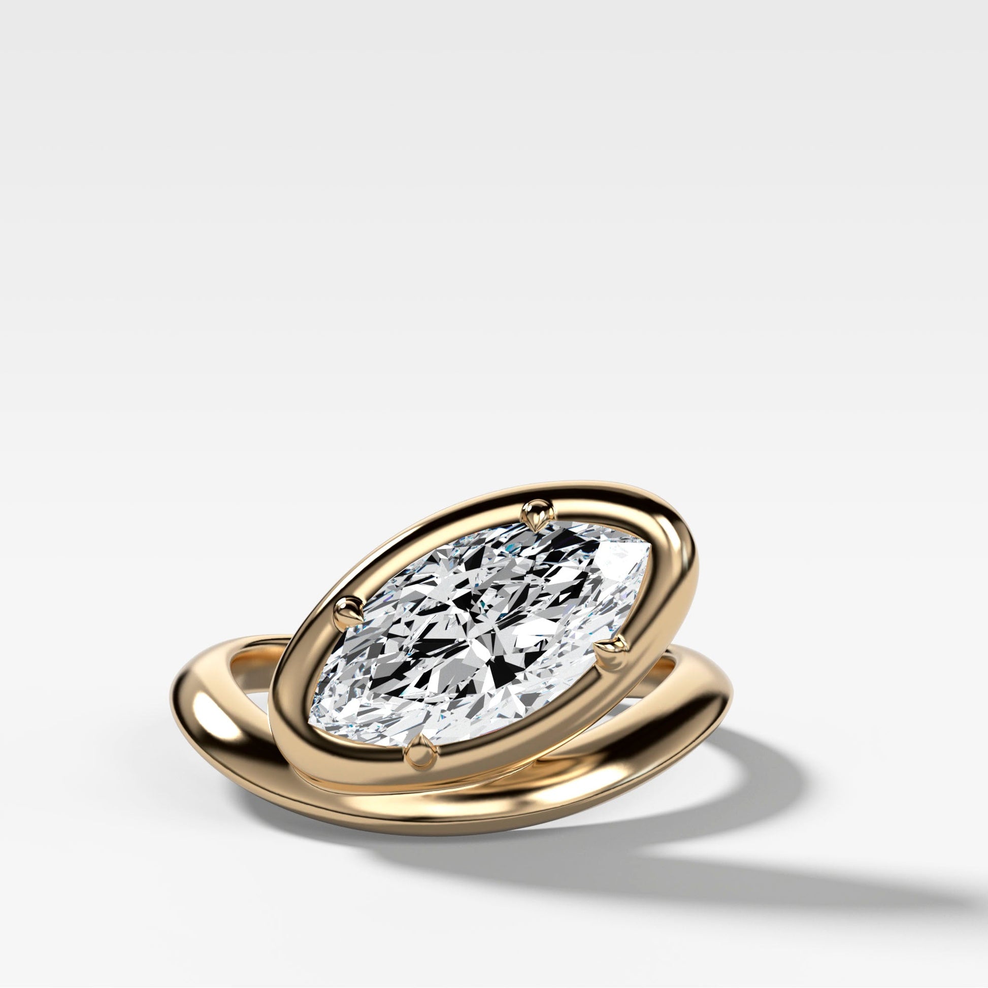 marquise-cut-contoured-engagement-ring-yellow-gold