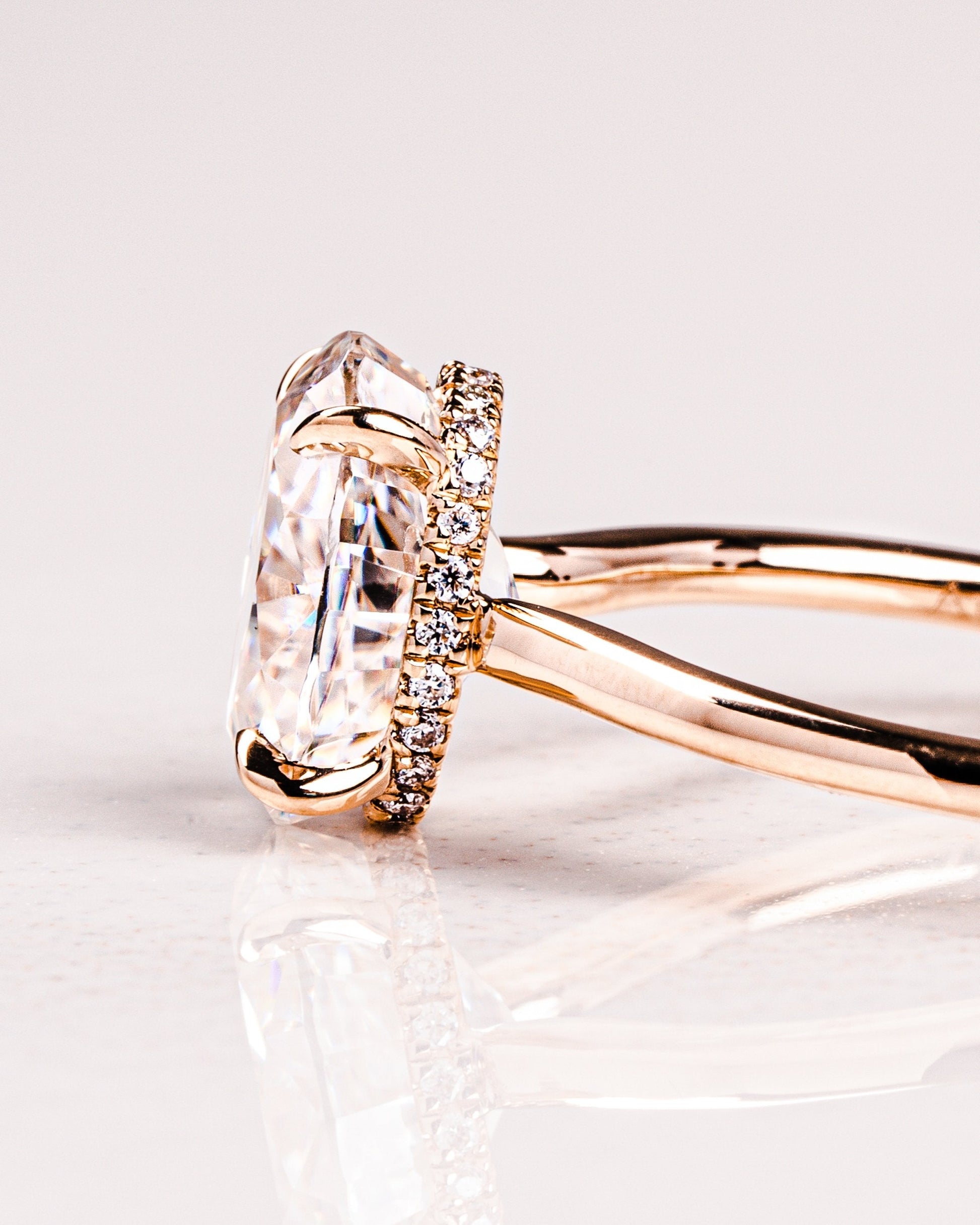 modern-oval-engagement-ring-rose-gold-side-view