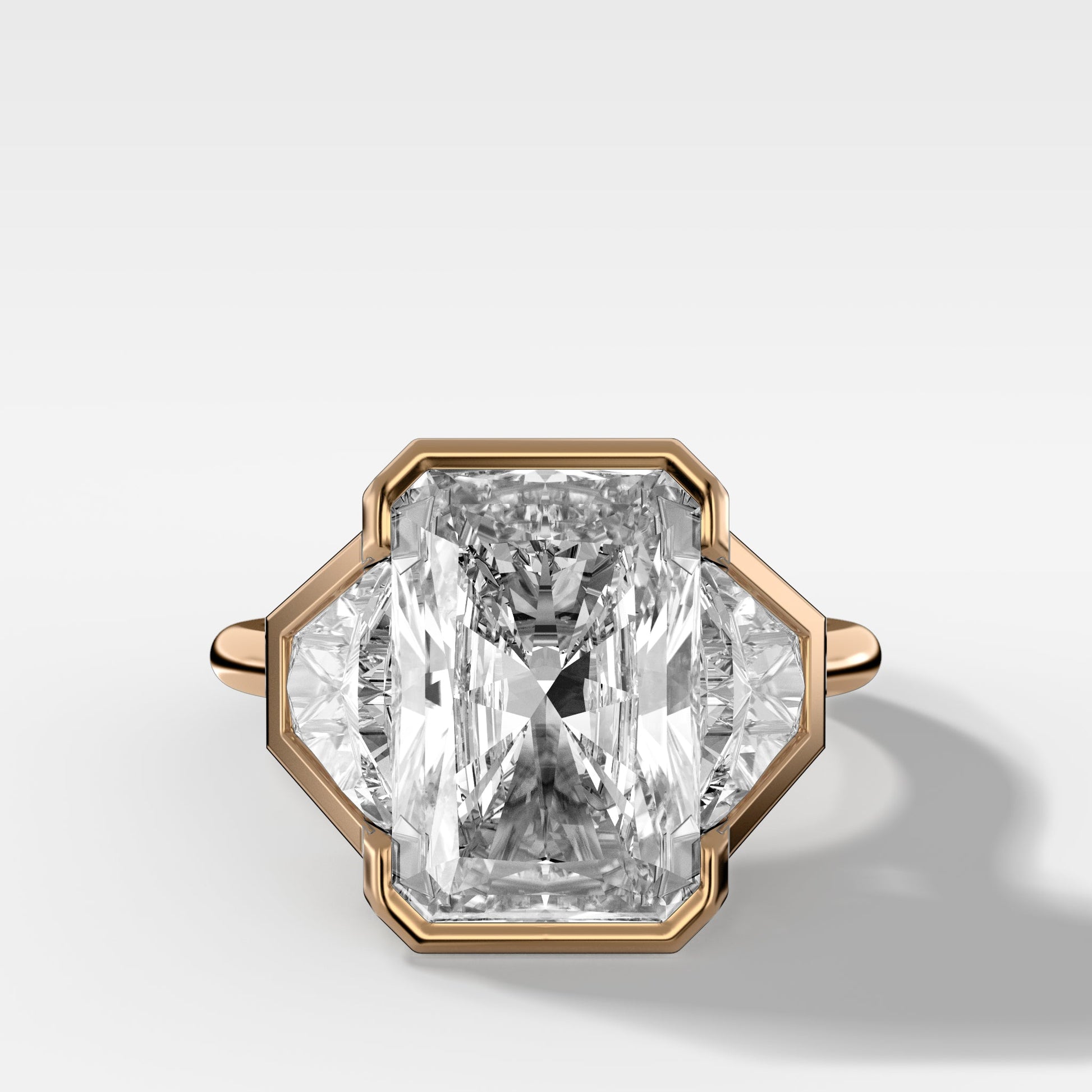 radiant-cut-bezel-set-three-stone-ring
